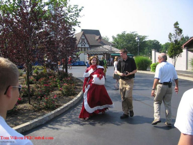 Maureen, dressed as Mrs. Claus, answers anxious questions about the newly reborn Winterfest.