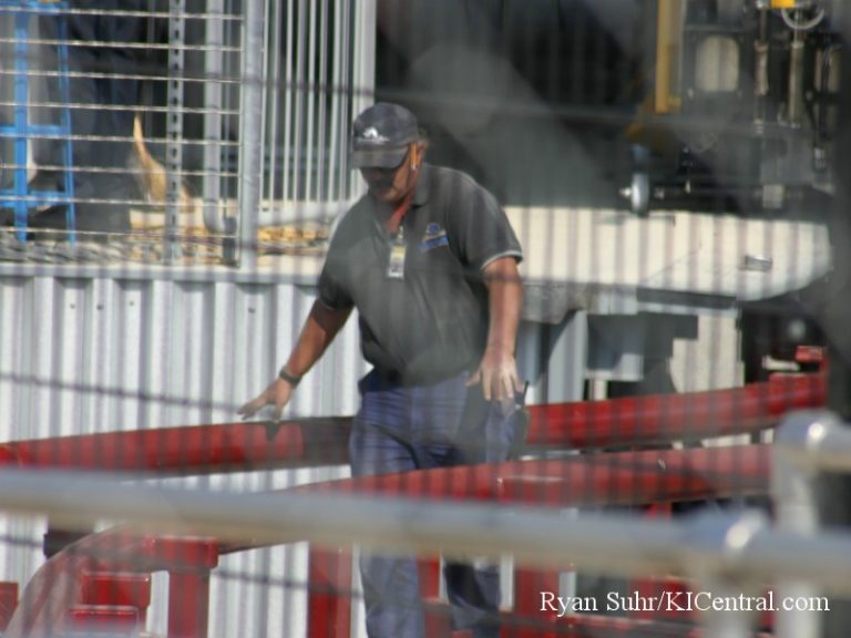Final Touches on Firehawk (Through the fence)