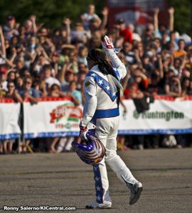 Greeting fans before the jump.