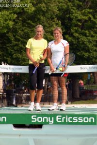 Kim Clijsters and Elena Dementieva play a tennis "match" inside the royal fountain to promote the upcoming Sony Ericsson WTA Tour.  2009