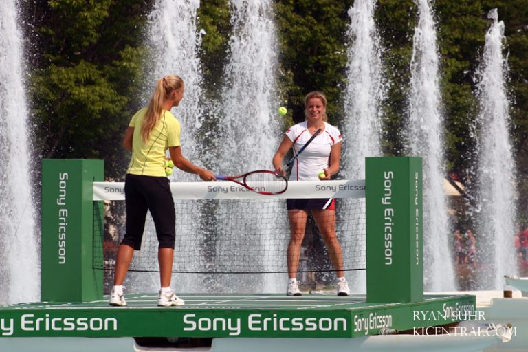 Kim Clijsters and Elena Dementieva play a tennis "match" inside the royal fountain to promote the upcoming Sony Ericsson WTA Tour.  2009