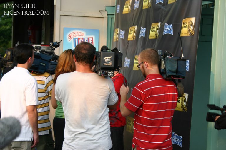 Nik Wallenda is swarmed by the media after walking a high wire 262' above Kings Island