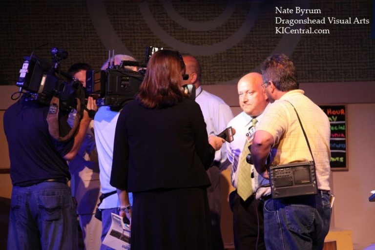 Don Helbig is hounded by the press at the Windseeker announcement.